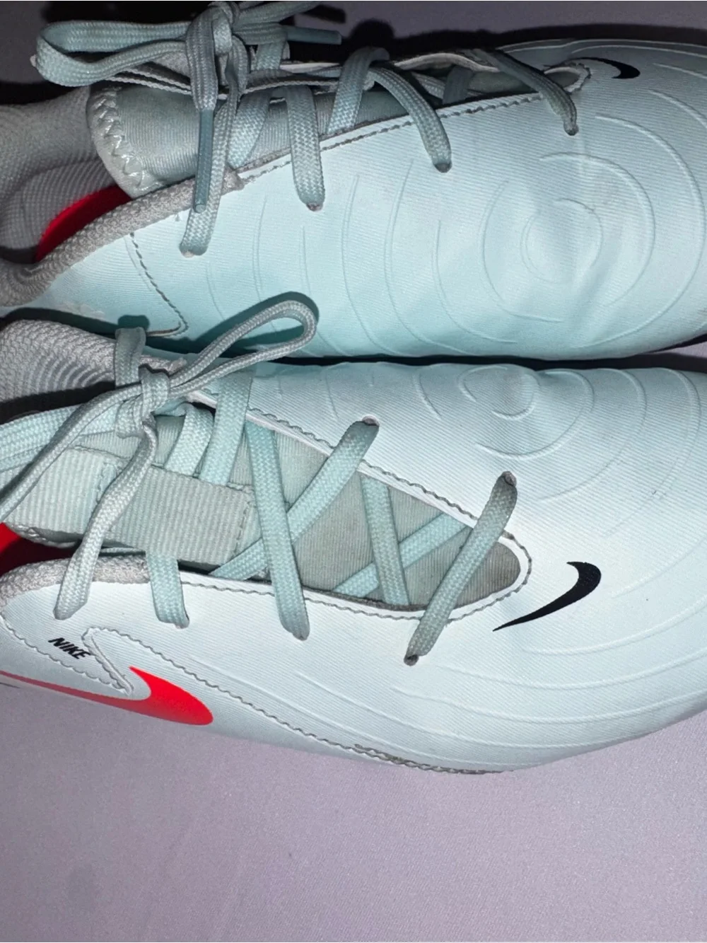 Nike Kids Light mint/White Soccer cleats with Black Swoosh